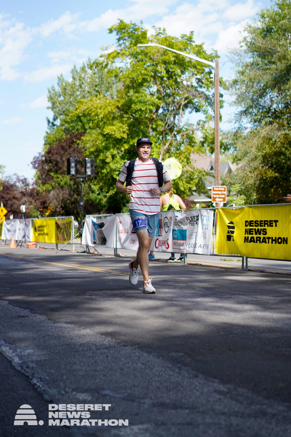 A photo of Devon Akmon nearing the finish line near Liberty Park in downtown Salt Lake City.