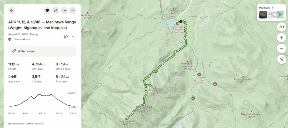 Screenshot of a hiking app showing the recorded route for 'ADK 11, 12, & 13/46 — MacIntyre Range (Wright, Algonquin, and Iroquois),' with a map tracing the trail from the Wilderness Campground at Heart Lake to all three summits, alongside stats showing 11.12 miles, 4,734 ft elevation gain, and 8 h 19 m moving time.