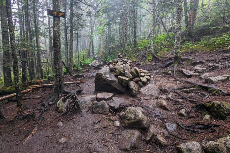 The cairn at the junction of the trails leading to the summits of Esther and Whiteface Mountains.