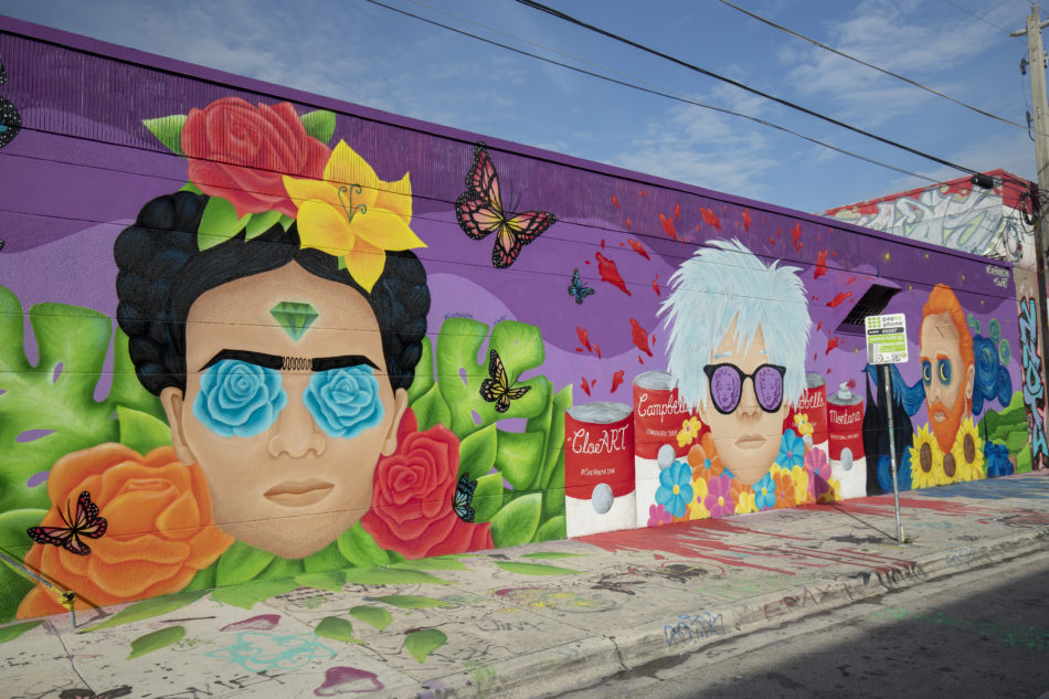 A photo of a mural of Kahlo, Warhol and Van Gogh in Miami's Wynwood arts district.